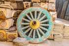 Old Cairo-Cairo-Egypt Wooden cart wheel and floor tiles in an alley in Cairo Art Print